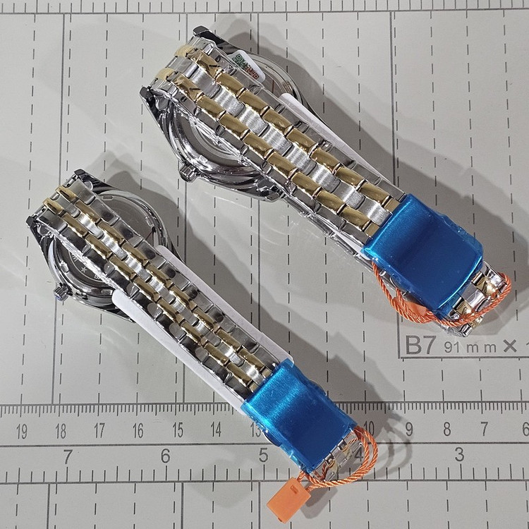 ست ساعت مچی عقربه ای کوارتز زنانه و مردانه اسکمی مدل 90-98 کد 05